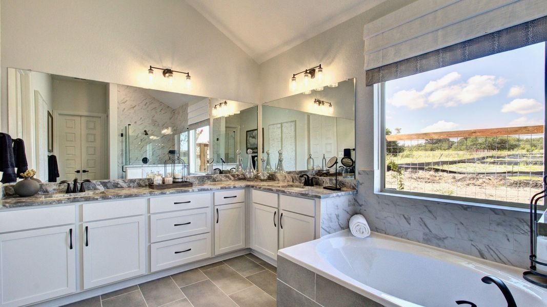 Furnished interior in a model home at The Crossvine in Schertz (Image 28).