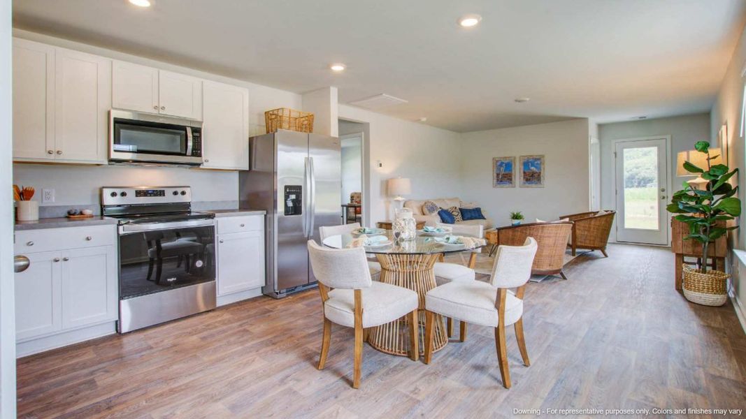 Furnished interior in a model home at Evergreen in Holly Hill (Image 5).