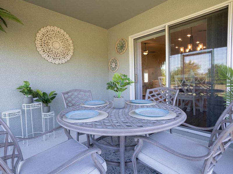 Enjoy dining al-fresco on your covered lanai - Raychel home plan