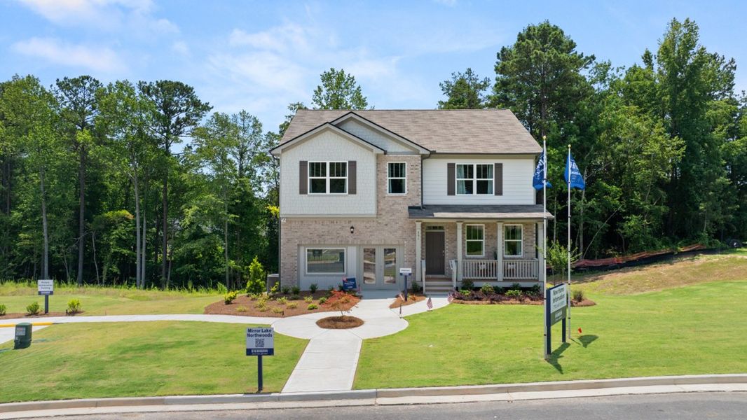 Front exterior of a home in the Northwoods at Mirror Lake community, located in Villa Rica, GA (Image 5).