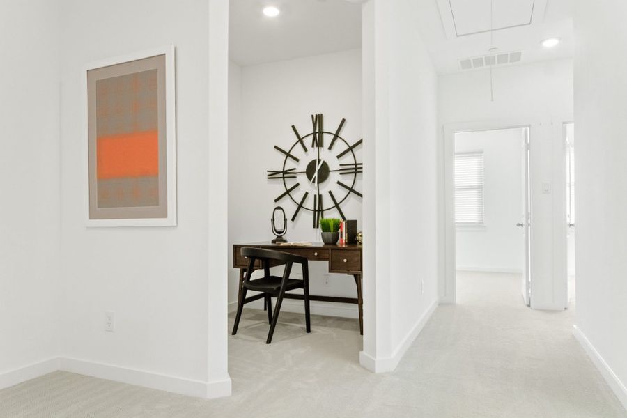Furnished interior in a model home at Windsong Ranch Townhomes in Prosper (Image 15).
