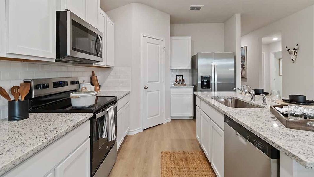 Furnished interior in a model home at The Birch at Spencer Ranch in Boerne (Image 16).