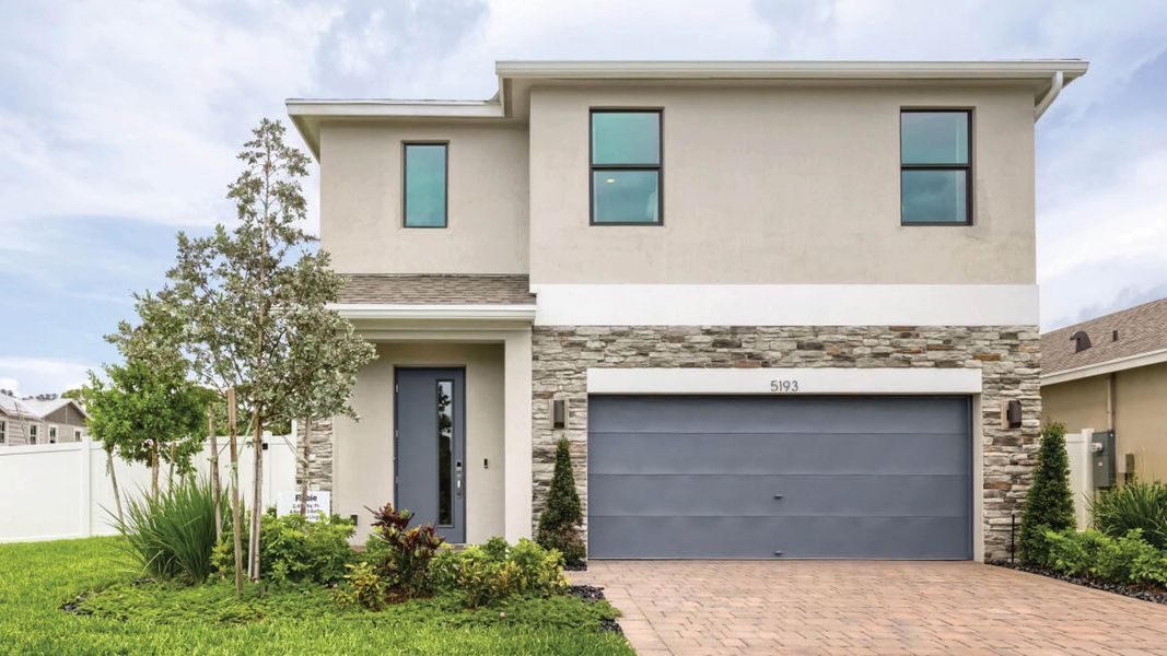 Front exterior of a home in the Blossom Trail community, located in Greenacres, FL (Image 9). Front exterior of a home in the Blossom Trail community, located in Greenacres, FL (Image 9).