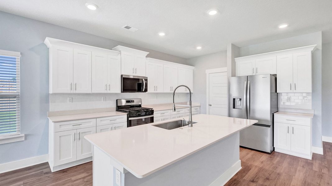 Furnished interior in a model home at Riverwood Gardens in Oakland (Image 9).