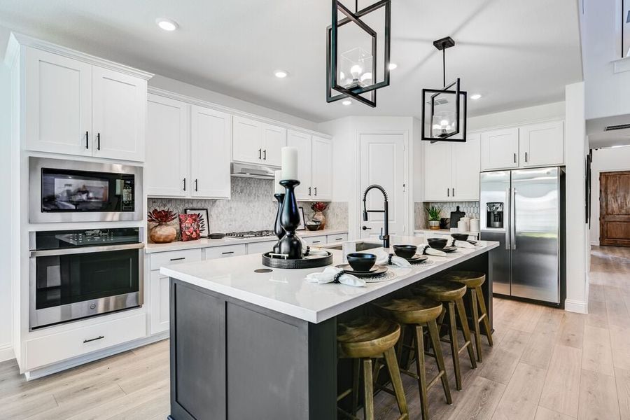Furnished interior in a model home at South Oak 50s in Oak Point (Image 69).