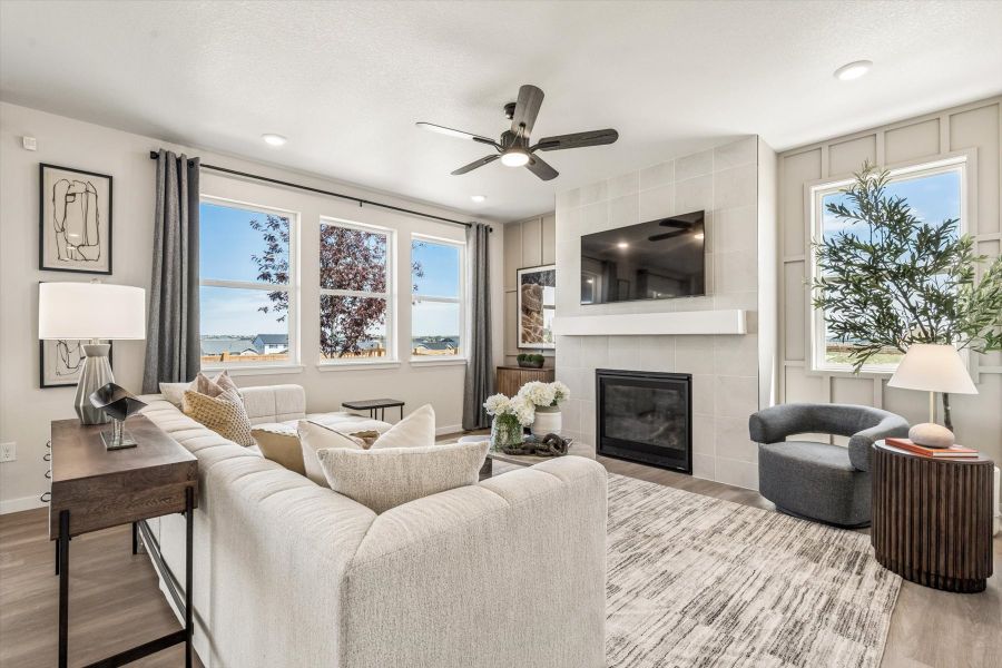 A living room with a fireplace. A living room with a fireplace.