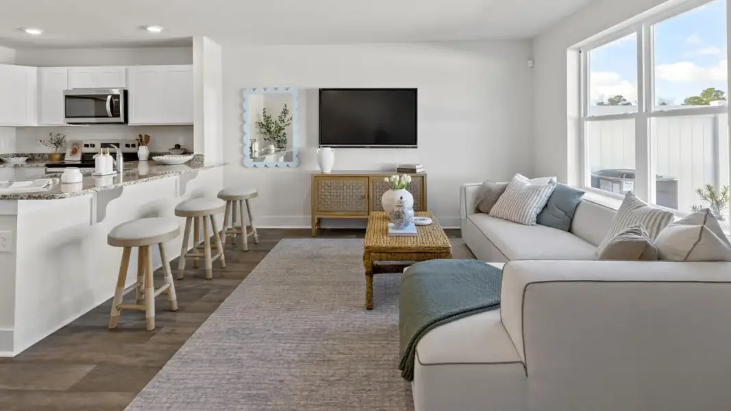 Furnished interior in a model home at The Townes at Cedar Hill Landing in Navassa (Image 10).