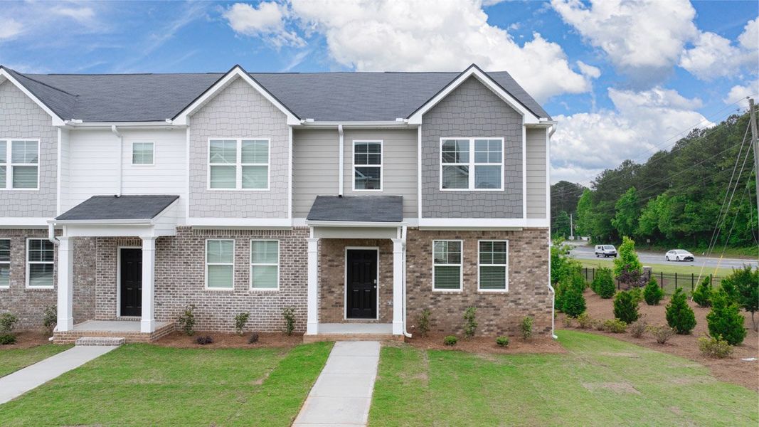 Front exterior of a home in the The Reserve at North Bridges community, located in McDonough, GA (Image 8).