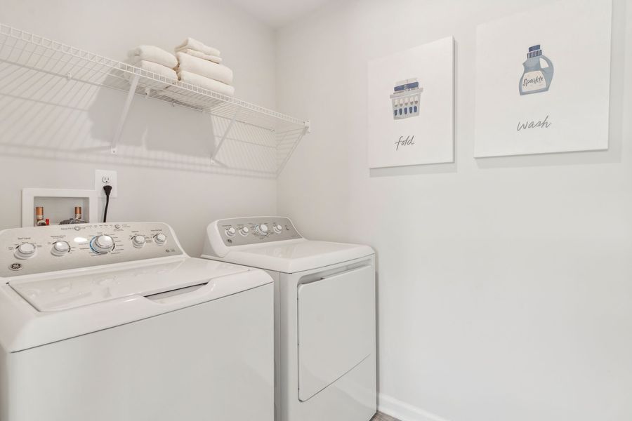 Convenient upper level laundry room so it's is close to the bedrooms