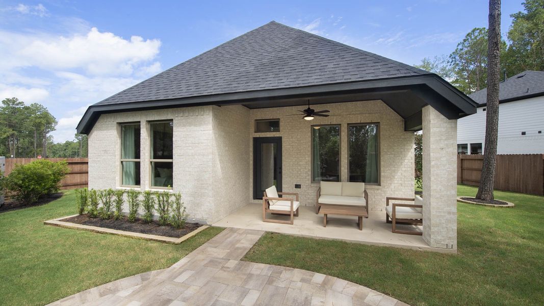 Front exterior of a home in the Woodhavyn 40' community, located in Magnolia, TX (Image 2). Front exterior of a home in the Woodhavyn 40' community, located in Magnolia, TX (Image 2).