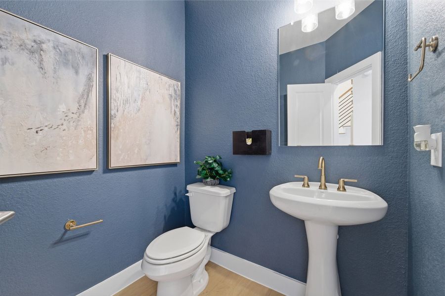 Furnished interior in a model home at Wildrye in Waller (Image 45).