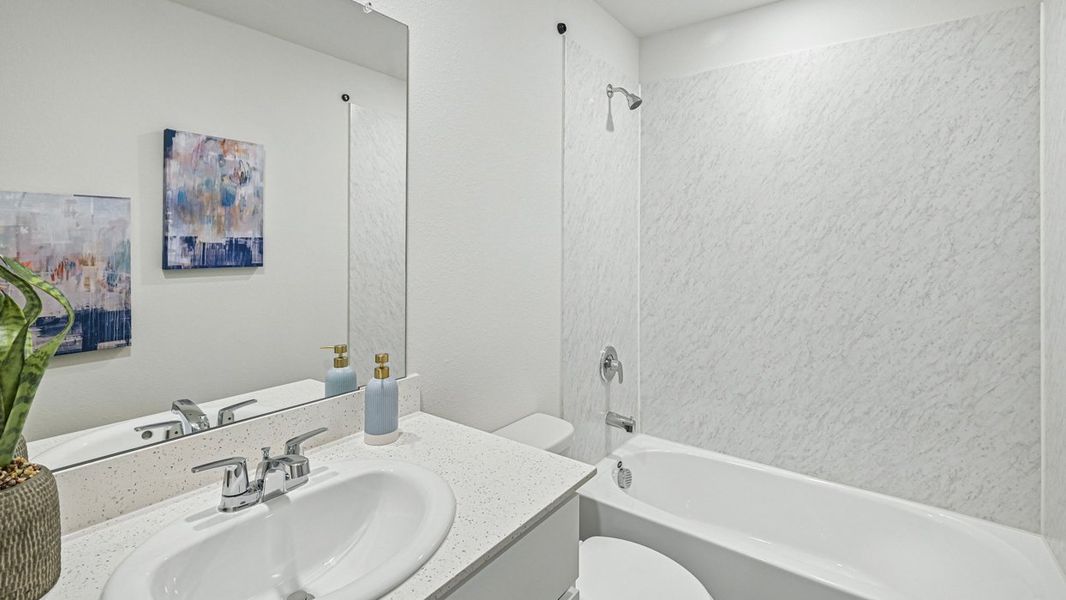 Furnished interior in a model home at Stonewood in Sulphur Springs (Image 46).