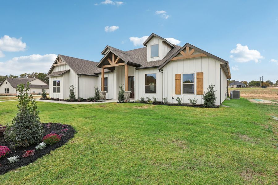Front exterior of a home in the Taylor Ranch community, located in Springtown, TX (Image 4).