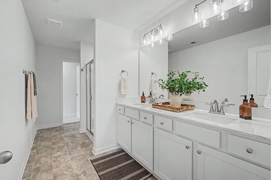 Furnished interior in a model home at The View at Groover’s Lake in Lithia Springs (Image 17).