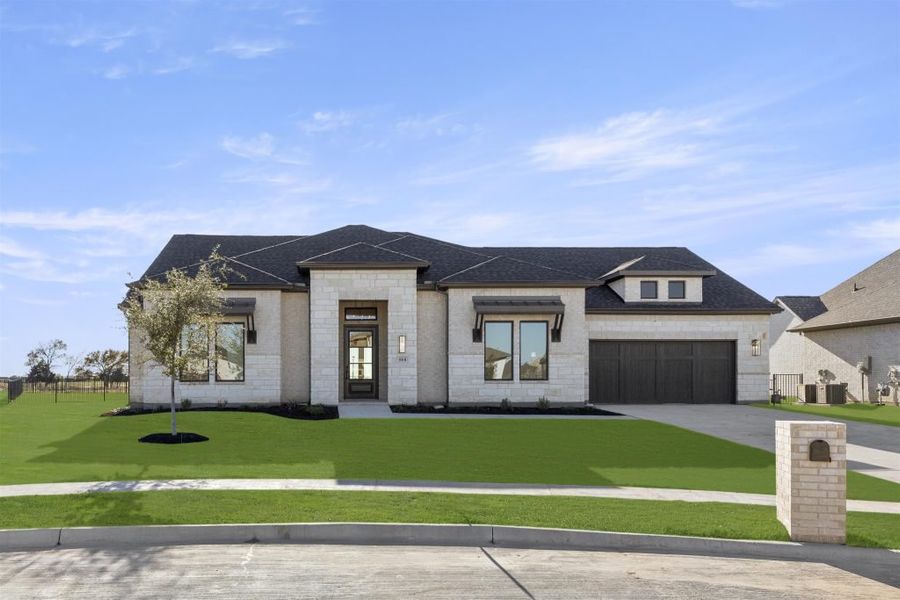 Front exterior of a home in the Heath Golf and Yacht Club community, located in Rockwall, TX (Image 26).