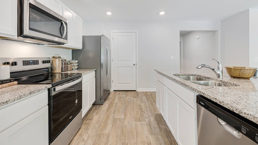 Furnished interior in a model home at Vineyard Trail in Jacksonville (Image 18).