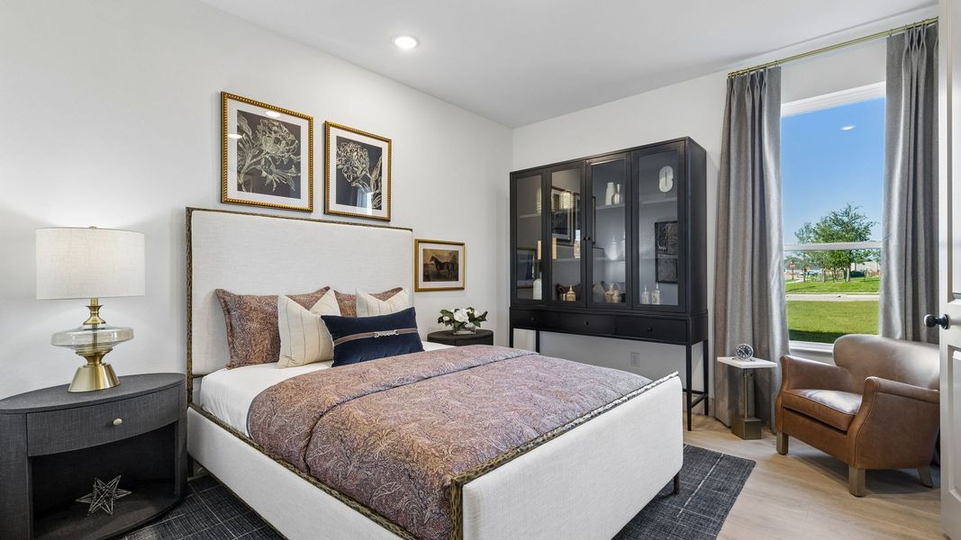 Furnished interior in a model home at Rainwater Crossing in Celina (Image 8). Furnished interior in a model home at Rainwater Crossing in Celina (Image 8).