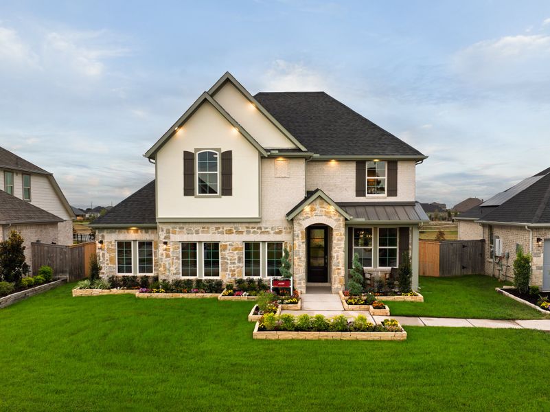 Front exterior of a home in the Arabella on the Prairie: Arabella 45' Homesites community, located in Richmond, TX (Image 1). Front exterior of a home in the Arabella on the Prairie: Arabella 45' Homesites community, located in Richmond, TX (Image 1).