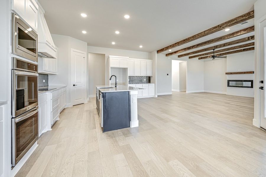 Furnished interior in a model home at Coppenger Place in Godley (Image 30).
