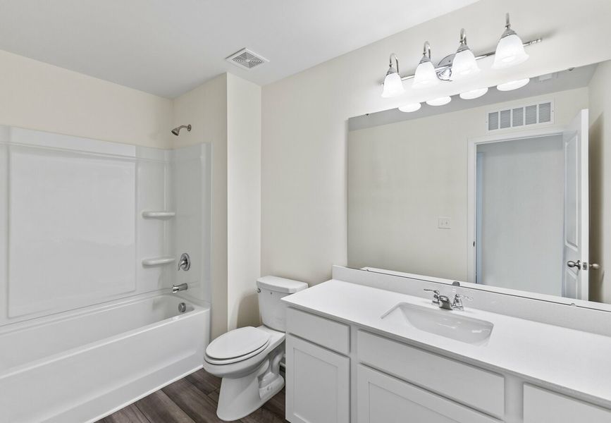 Furnished interior in a model home at The Summit at Carters Station in Columbia (Image 18).