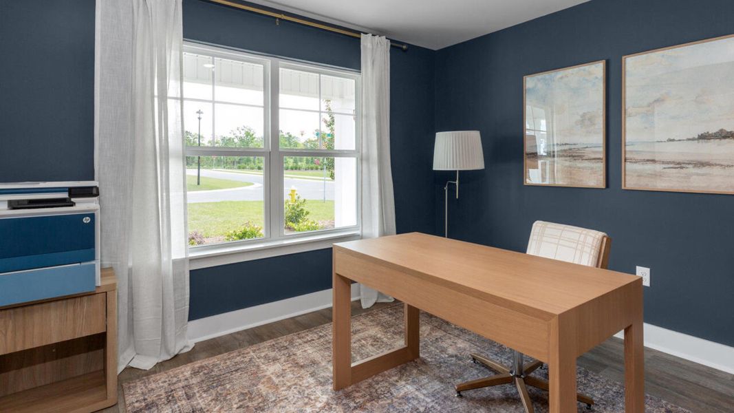 Furnished interior in a model home at Eagle Creek in Bolivia (Image 15).