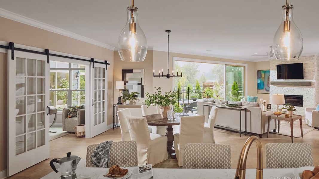 Furnished interior in a model home at The Courtyards at Hodges Farm in Charlotte (Image 18).