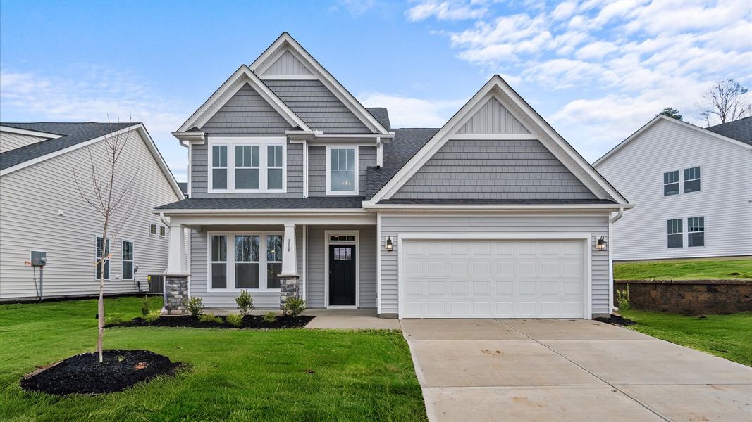 Notable street presence with tasteful elevation and thoughtful landscaping Notable street presence with tasteful elevation and thoughtful landscaping