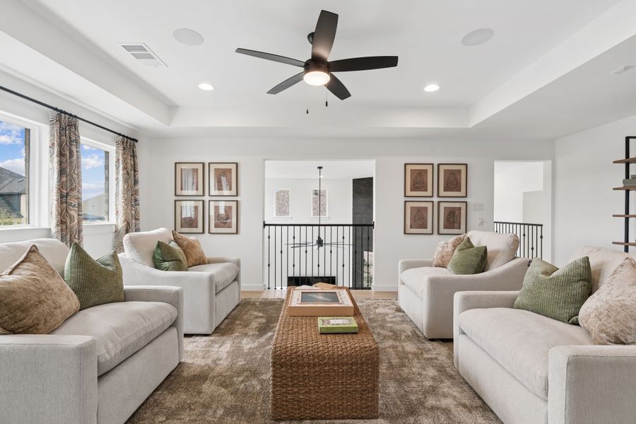 Furnished interior in a model home at Sweetgrass 65s in Haslet (Image 34).