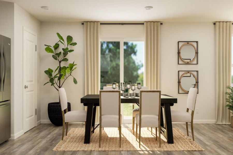 A dining room with a table and chairs. A dining room with a table and chairs.