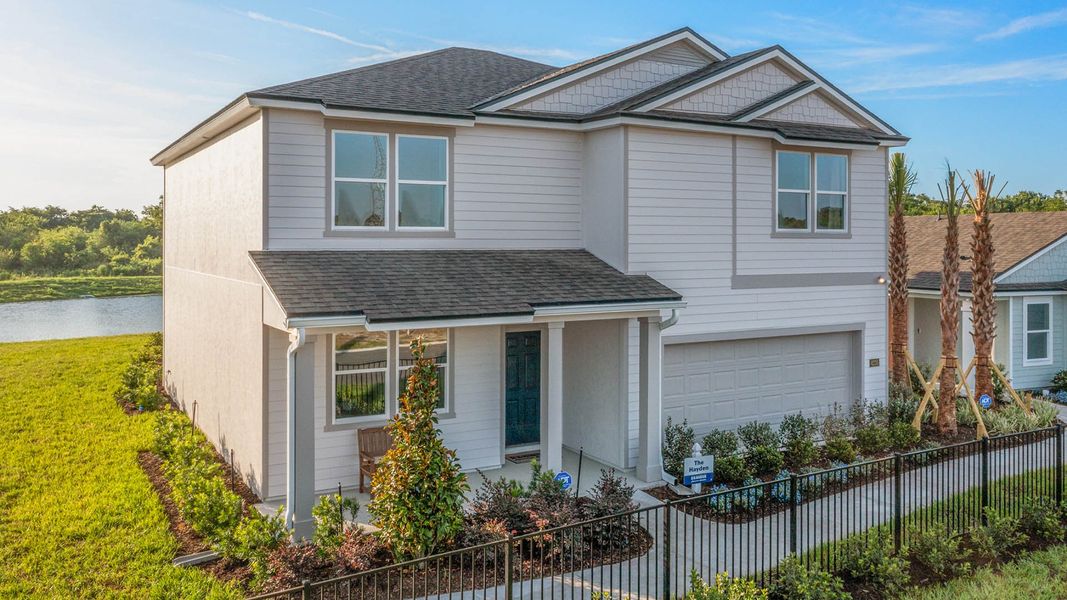 Front exterior of a home in the Rookery community, located in Green Cove Springs, FL (Image 4).