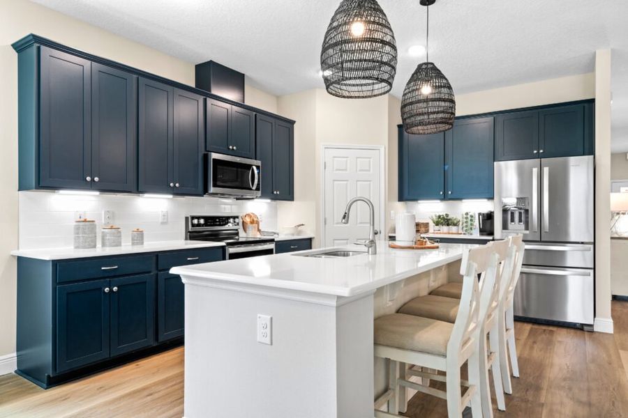 Furnished interior in a model home at The Lakes at St. Sebastian Preserve in Sebastian (Image 24).