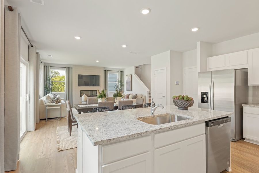 A kitchen with white cabinets. A kitchen with white cabinets.