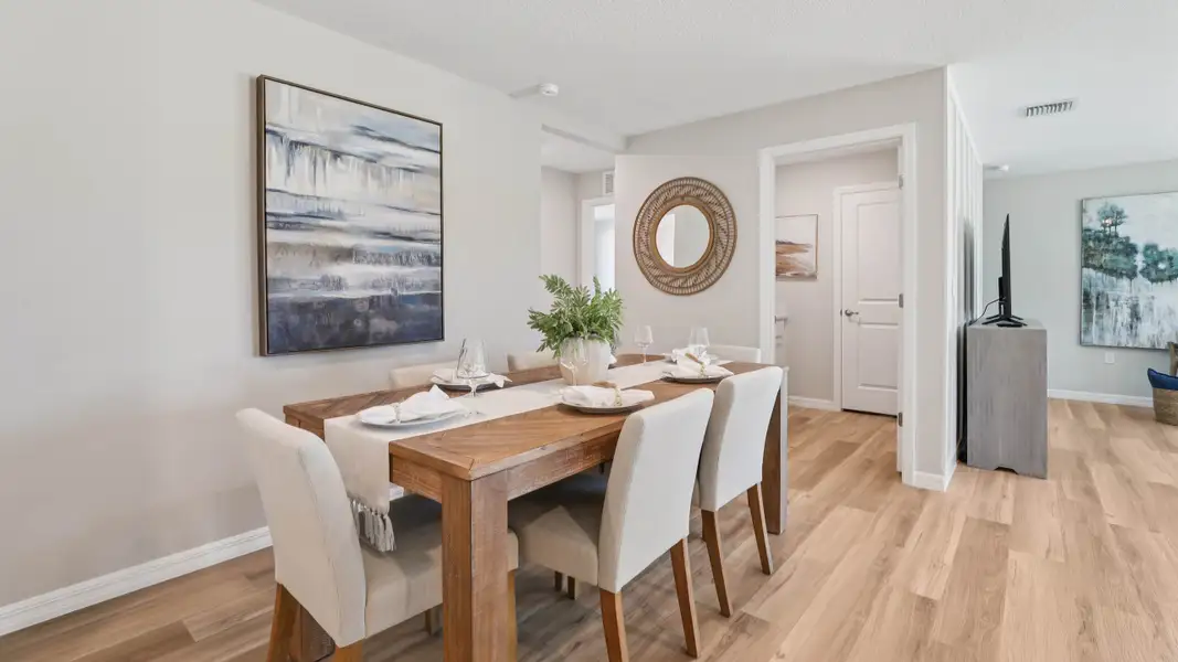 Furnished interior in a model home at McGinley Landing in Ocala (Image 5).