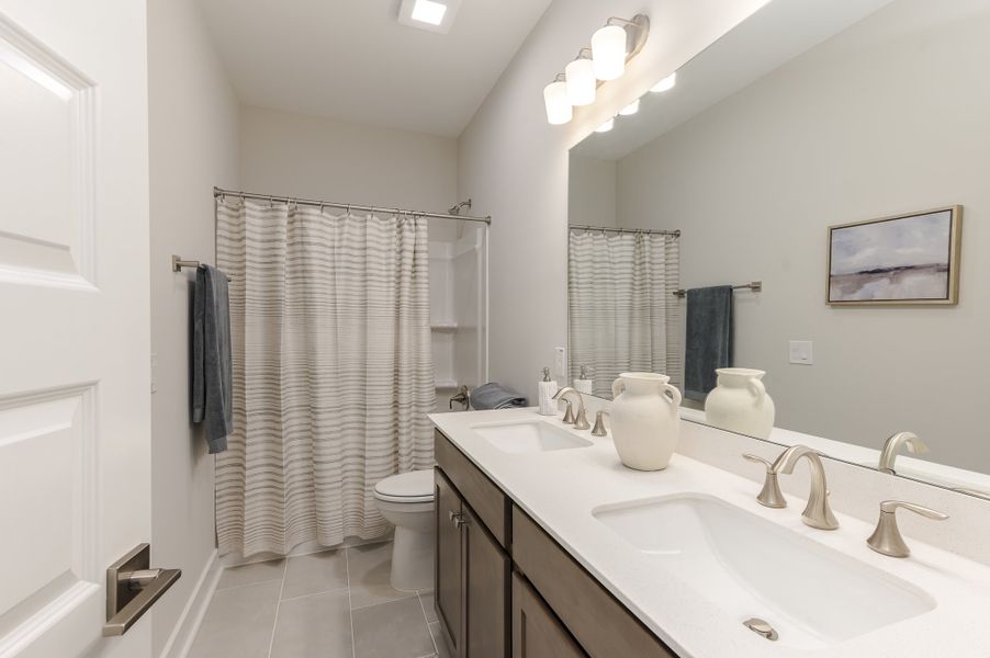 Furnished interior in a model home at Founder's Park in Summerville (Image 27).