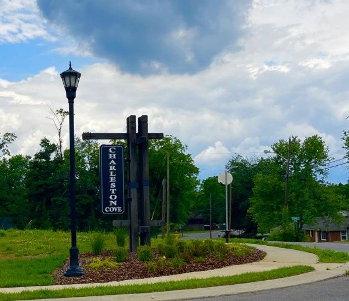 Entrance to the Charleston Cove community in Clarksville, TN, featuring signage and landscaping (Image 1). Entrance to the Charleston Cove community in Clarksville, TN, featuring signage and landscaping (Image 1).