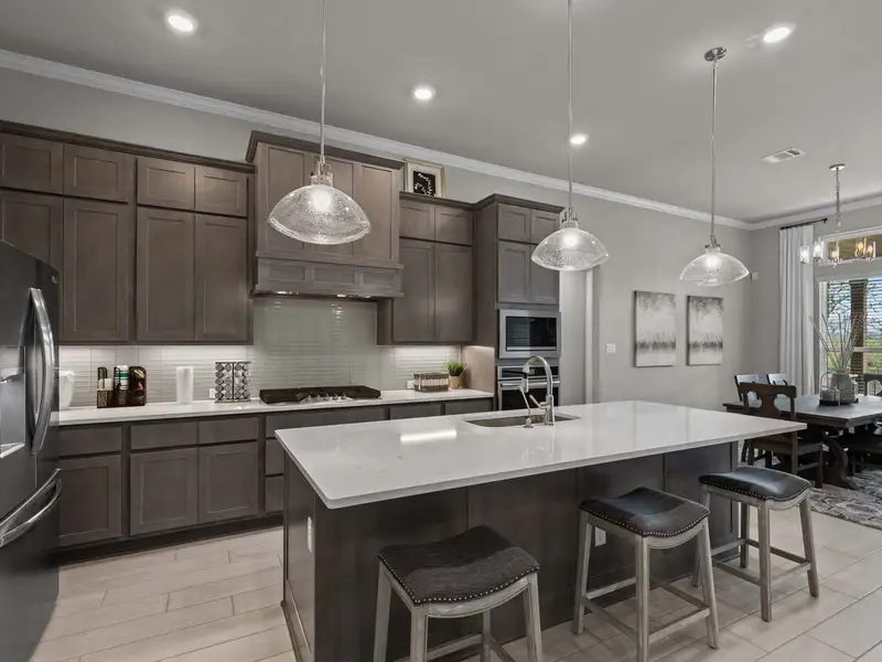 Furnished interior in a model home at The Reserve at Potranco Oaks in Castroville (Image 5).