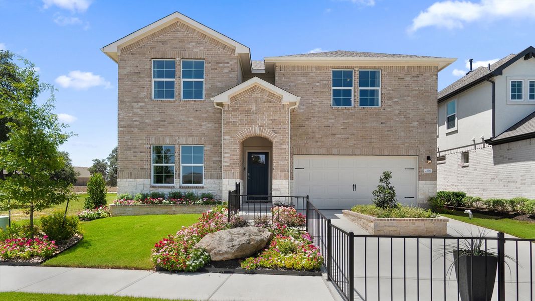 Front exterior of a home in the Rosenbusch Ranch community, located in Leander, TX (Image 11).