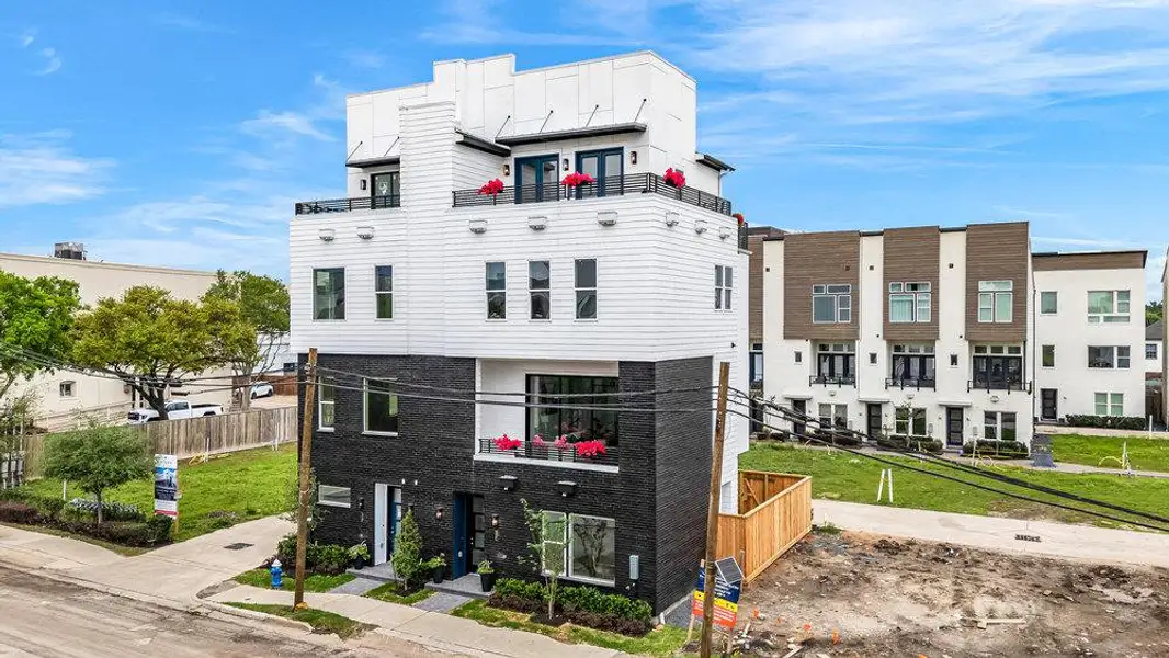 Front exterior of a home in the Commerce Row community, located in Houston, TX (Image 2). Front exterior of a home in the Commerce Row community, located in Houston, TX (Image 2).