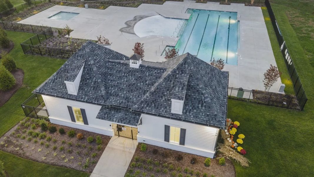 Elegantly designed clubhouse with pristine pools, manicured gardens, and classic architecture in Shelton Square, Tennessee.