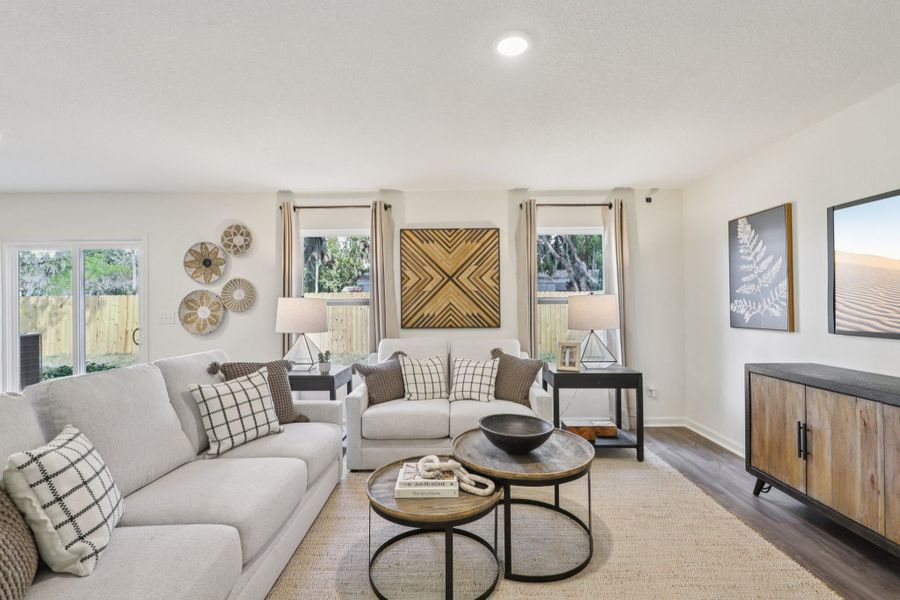 A living room with a large window.
