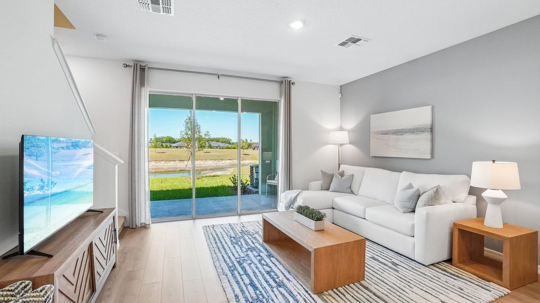 Furnished interior in a model home at Sanctuary at Citrus Park Townhomes in Tampa (Image 13).