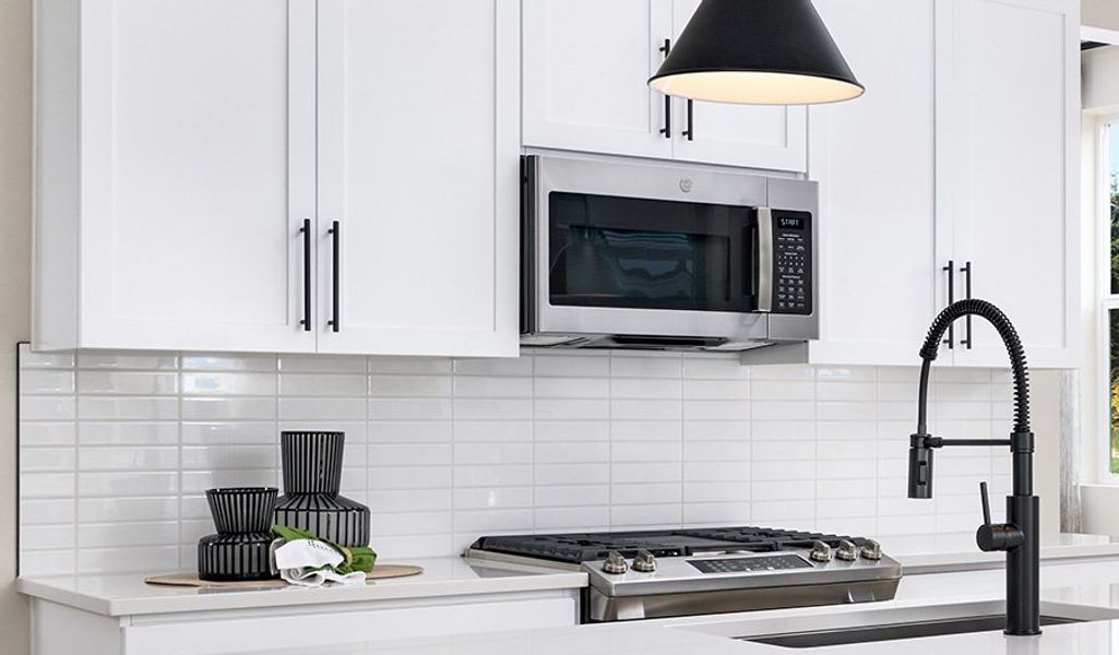 Furnished interior in a model home at Meadowbrook Park in Colorado Springs (Image 7).