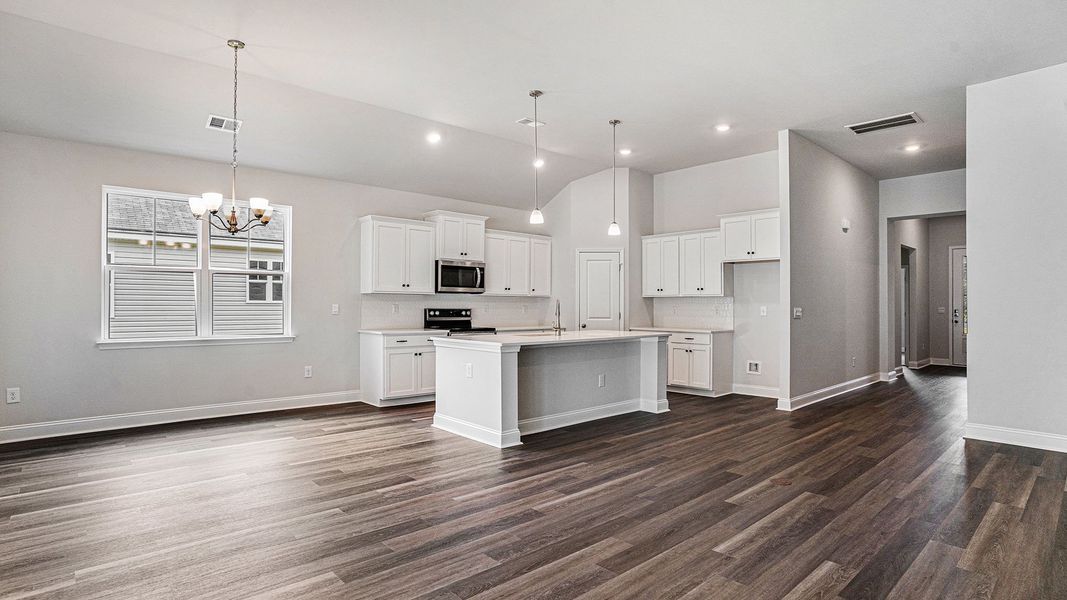 Furnished interior in a model home at Spring View Landing in Loris (Image 16).