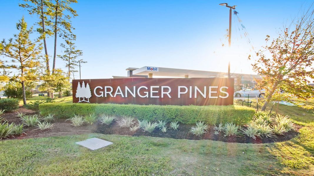 Entrance to the Granger Pines community in Conroe, TX, featuring signage and landscaping (Image 1).