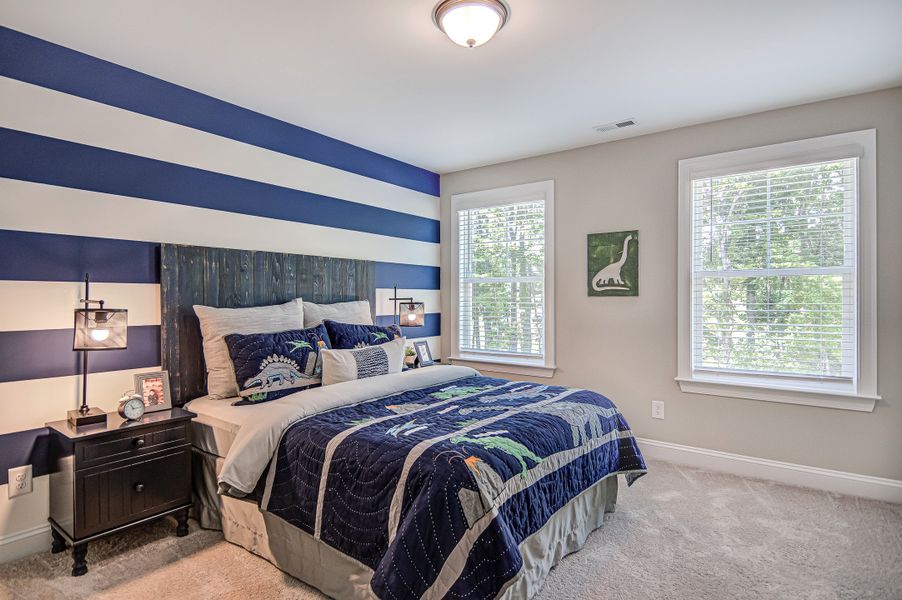 Furnished interior in a model home at Cottages at Piper Village in Trinity (Image 11).