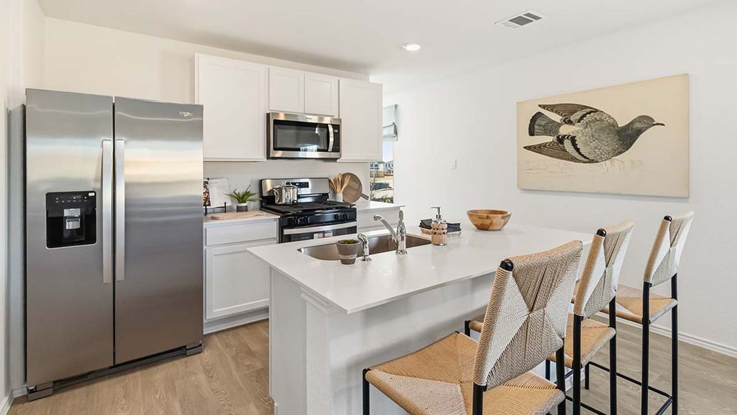 Furnished interior in a model home at Hickory Ridge in Elmendorf (Image 12).