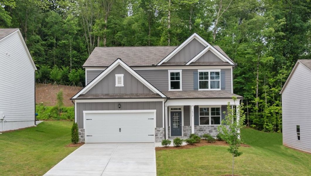 Front exterior of a home in the South Wind community, located in South Fulton, GA (Image 5). Front exterior of a home in the South Wind community, located in South Fulton, GA (Image 5).