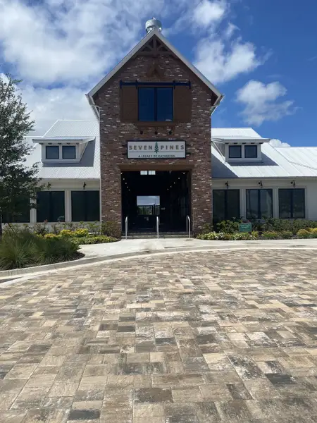 Charming community center with rustic brick facade at Seven Pines by ICI Homes in Jacksonville, FL.