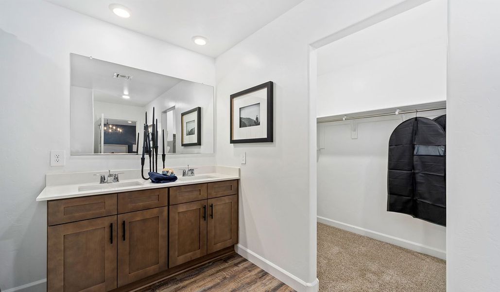 Furnished interior in a model home at Redford Estates in Tucson (Image 28).