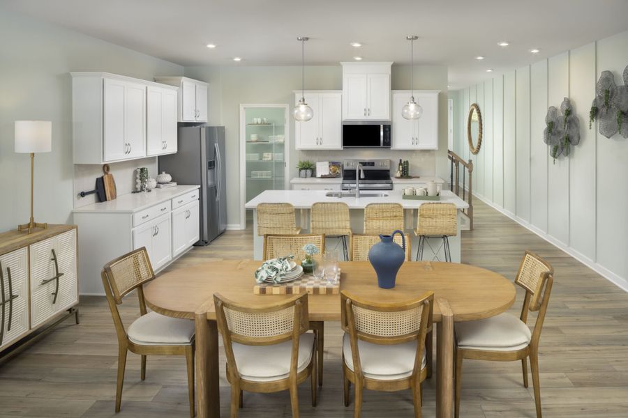 Furnished interior in a model home at Townes at Milhaven in Charlotte (Image 2).